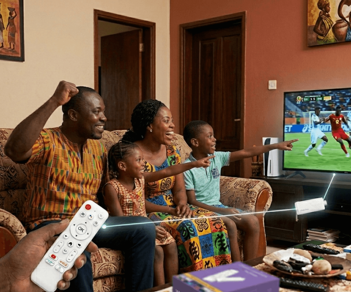 Family watching TV together